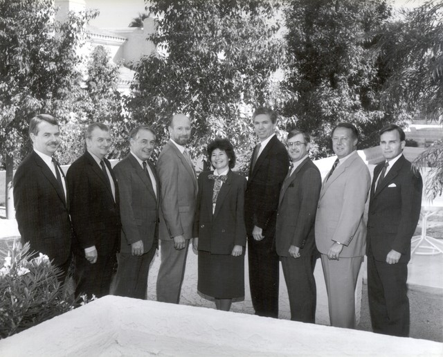 1987 THISCO planning meeting: (from left) Bruce Covill, John B. Evans, Bob McGrail, Bill Watson; (from right) John Ballantyne, Jim Yoakum, Tom Castleberry. 